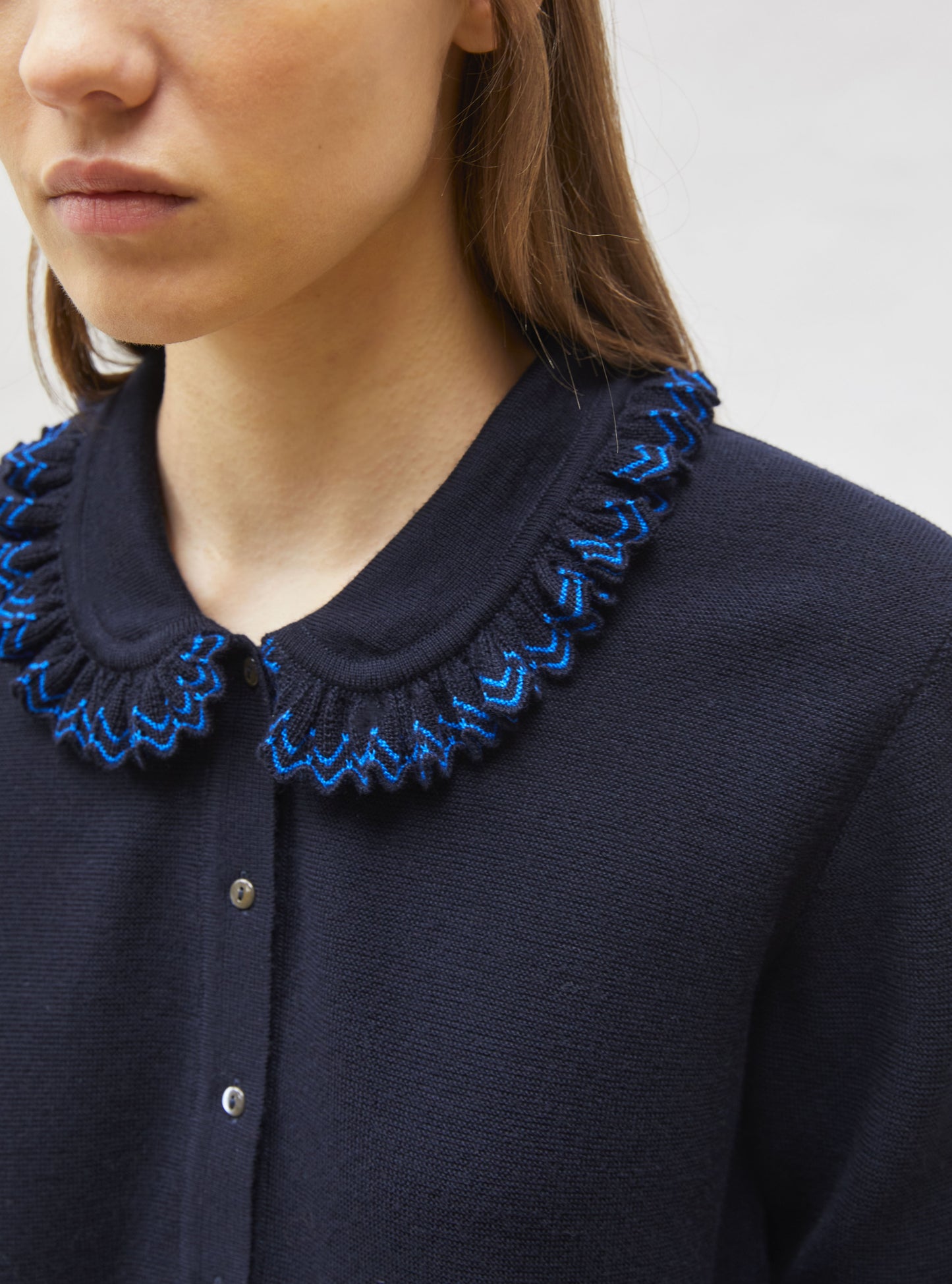 chemise en maille col volanté