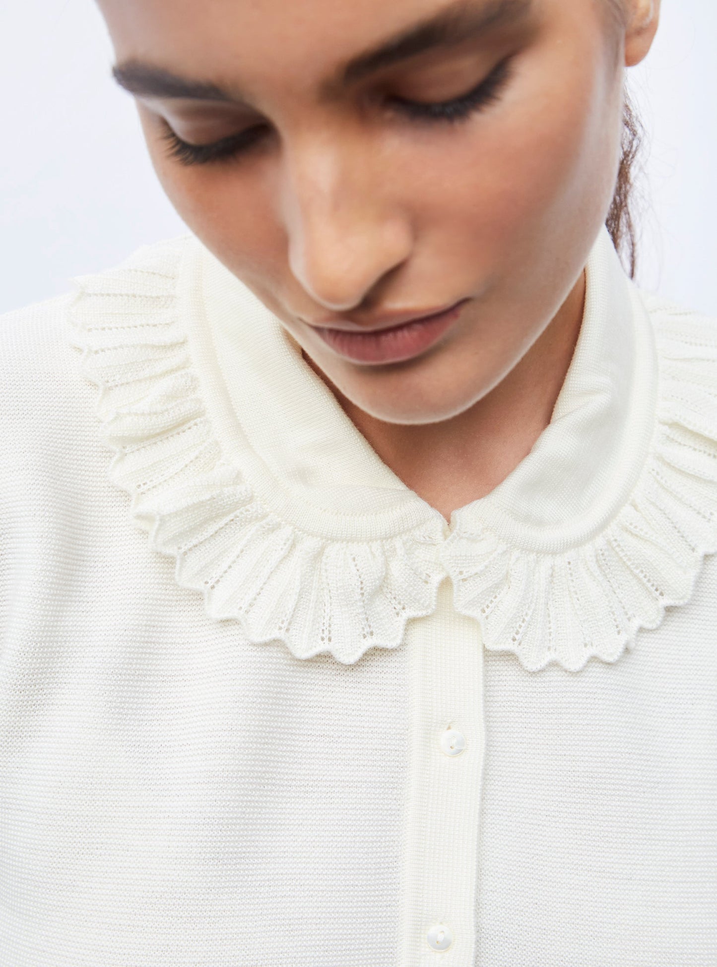 chemise en maille col volanté