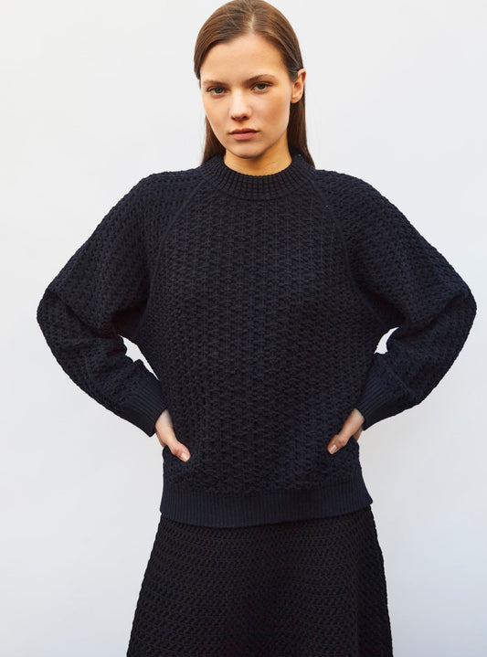 pull loose maille entrelacée