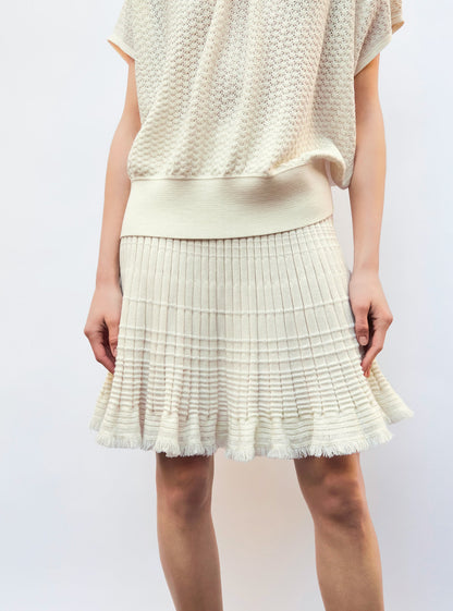 jupe courte en maille à frange