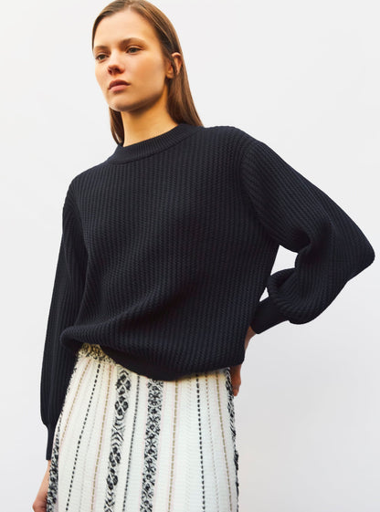 sweater en maille torsade