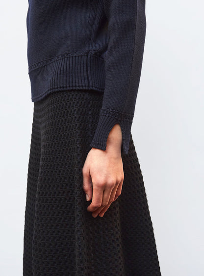 pull droit détails tressés